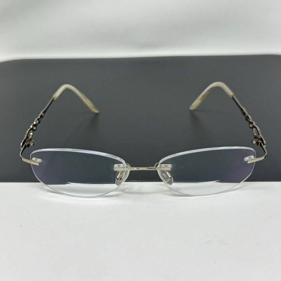 Charmant Eyeglasses CH11914 WP Rimless Frame 51[]17 130